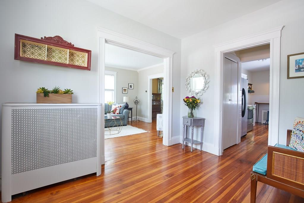 202 Metropolitan Avenue Boston, MA 02131 - Photo 2 of 31 a view of livingroom with furniture and wooden floor