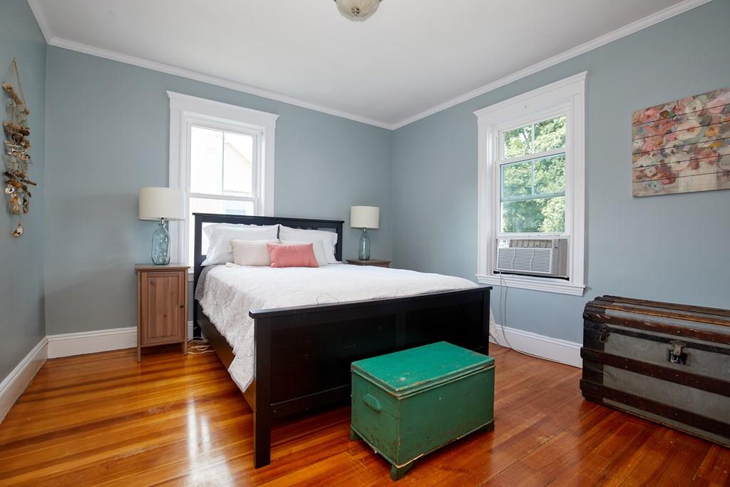 202 Metropolitan Avenue Boston, MA 02131 - Photo 22 of 31 a bedroom with a bed and a window