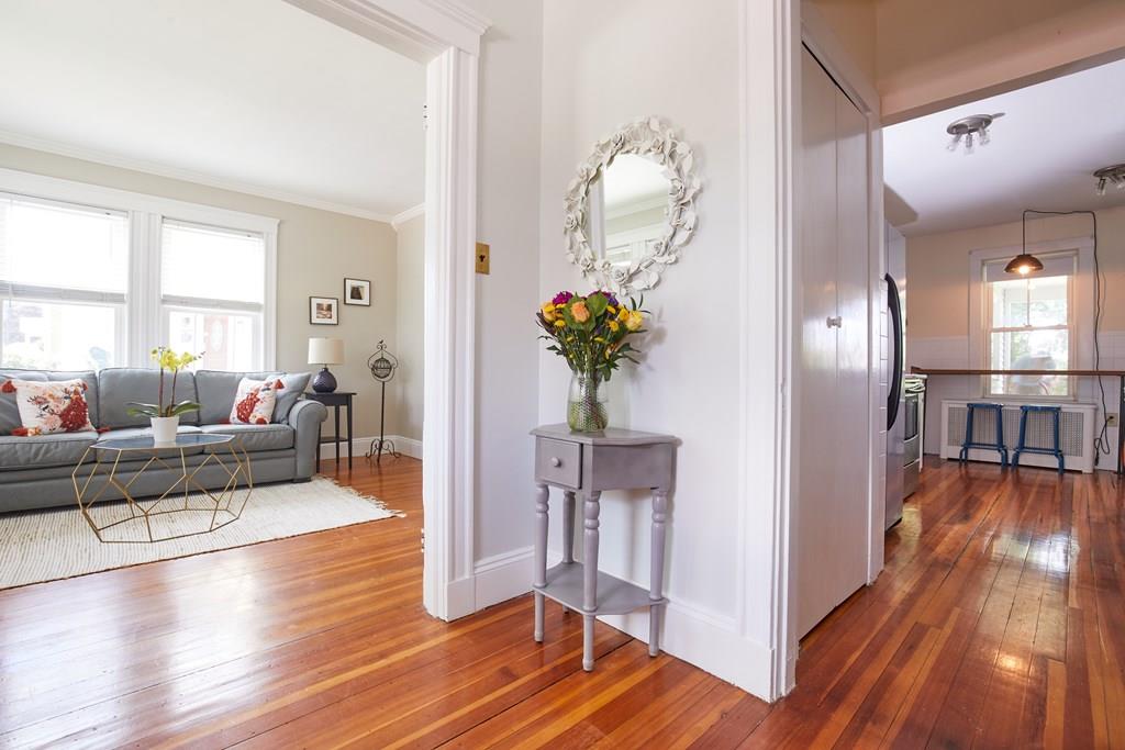 202 Metropolitan Avenue Boston, MA 02131 - Photo 4 of 31 a view of a living room and dining room