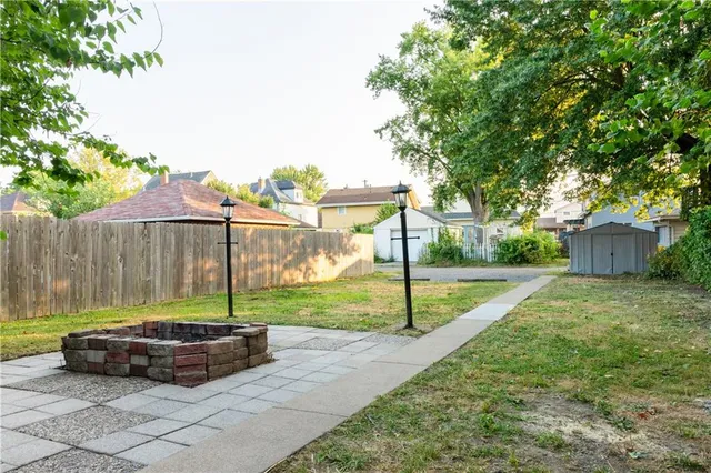 a view of water heater room with stairs
