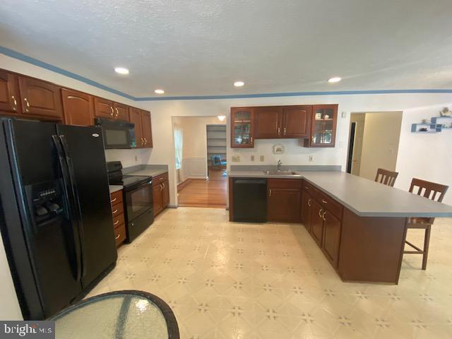 1718 Ballenger Creek Point Point of Rocks, MD 21777 - Photo 11 of 45 a large kitchen with stainless steel appliances granite countertop a sink refrigerator and cabinets