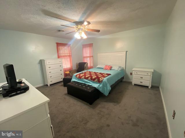 1718 Ballenger Creek Point Point of Rocks, MD 21777 - Photo 23 of 45 a bedroom with a bed and a chandelier