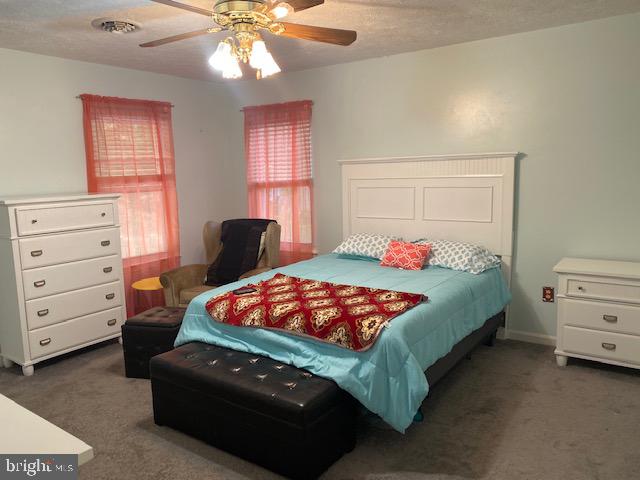 1718 Ballenger Creek Point Point of Rocks, MD 21777 - Photo 24 of 45 a bedroom with a bed and a window