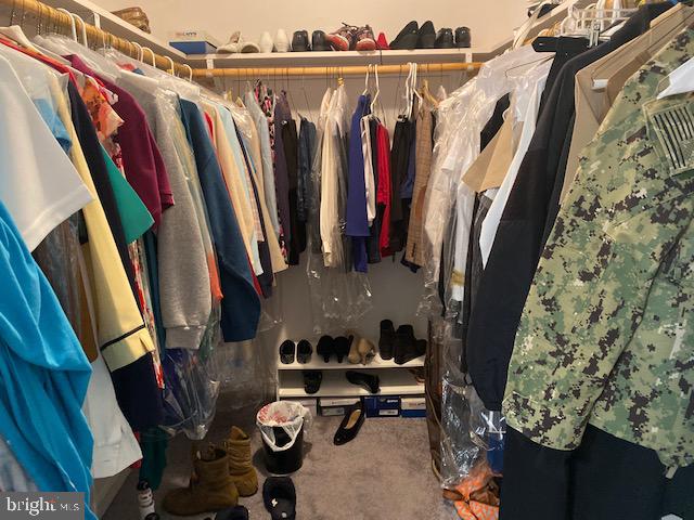 1718 Ballenger Creek Point Point of Rocks, MD 21777 - Photo 25 of 45 a view of walk in closet with clothes and shoes