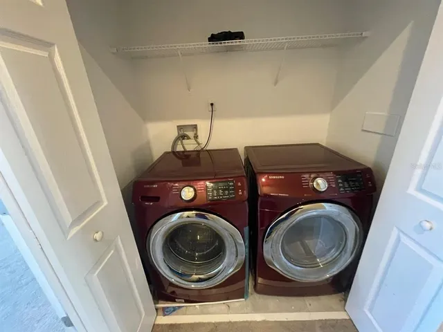 a utility room with dryer and washer