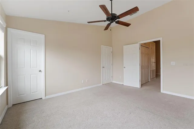 a view of a livingroom with a ceiling fan