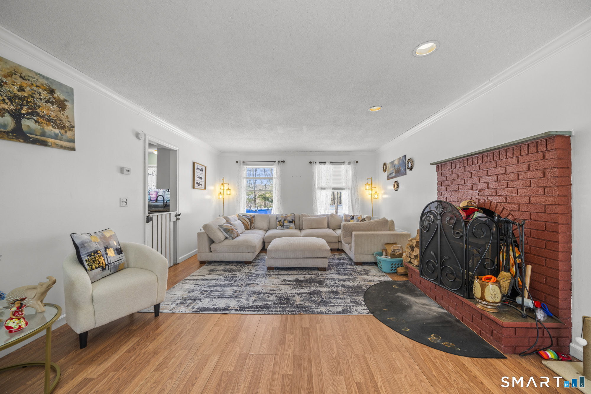 184 Black Hill Road Plainfield, CT 06374 - Photo 12 of 39 a living room with furniture and a couch
