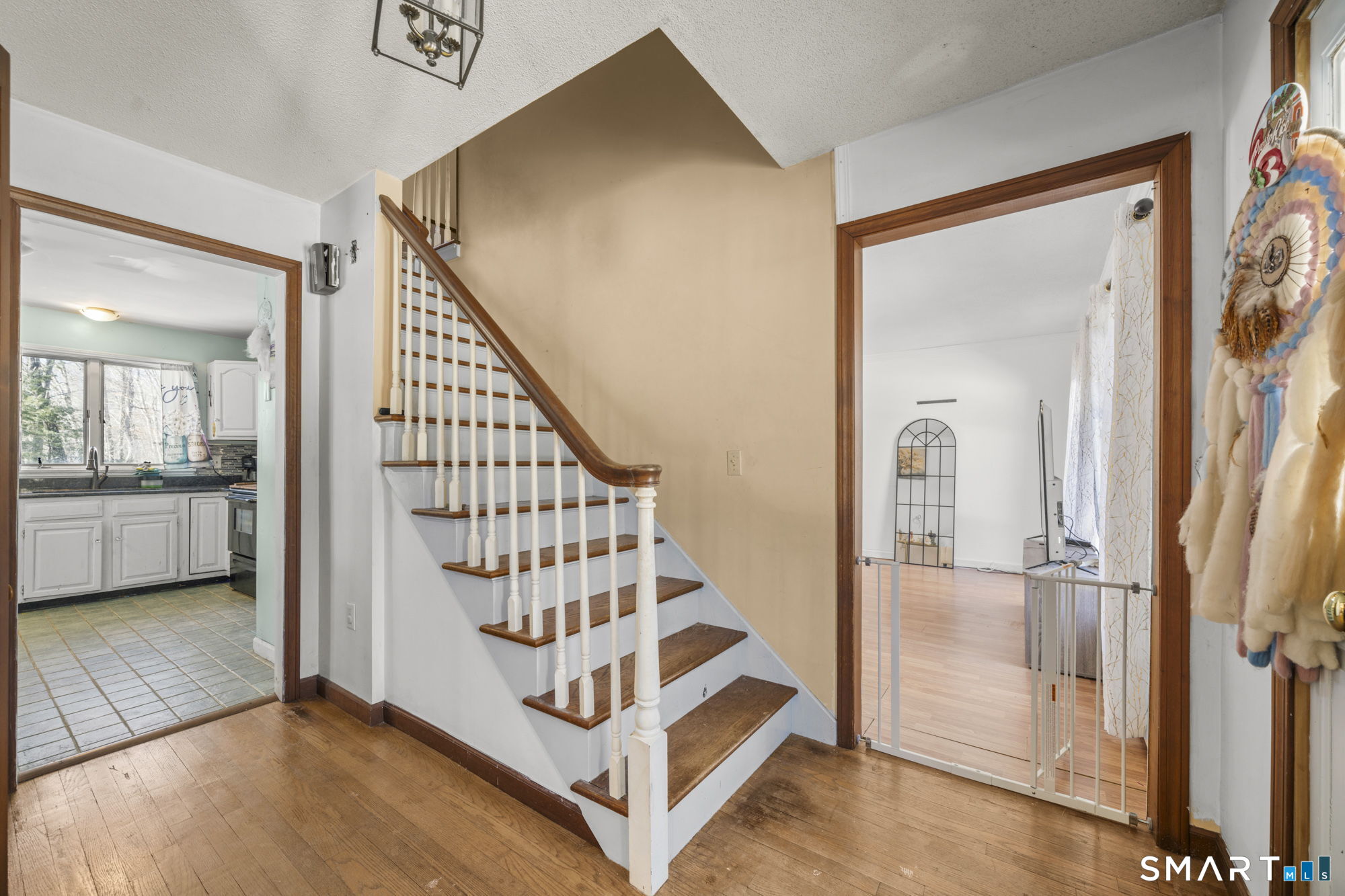 184 Black Hill Road Plainfield, CT 06374 - Photo 15 of 39 a view of a hallway with entryway and wooden floor