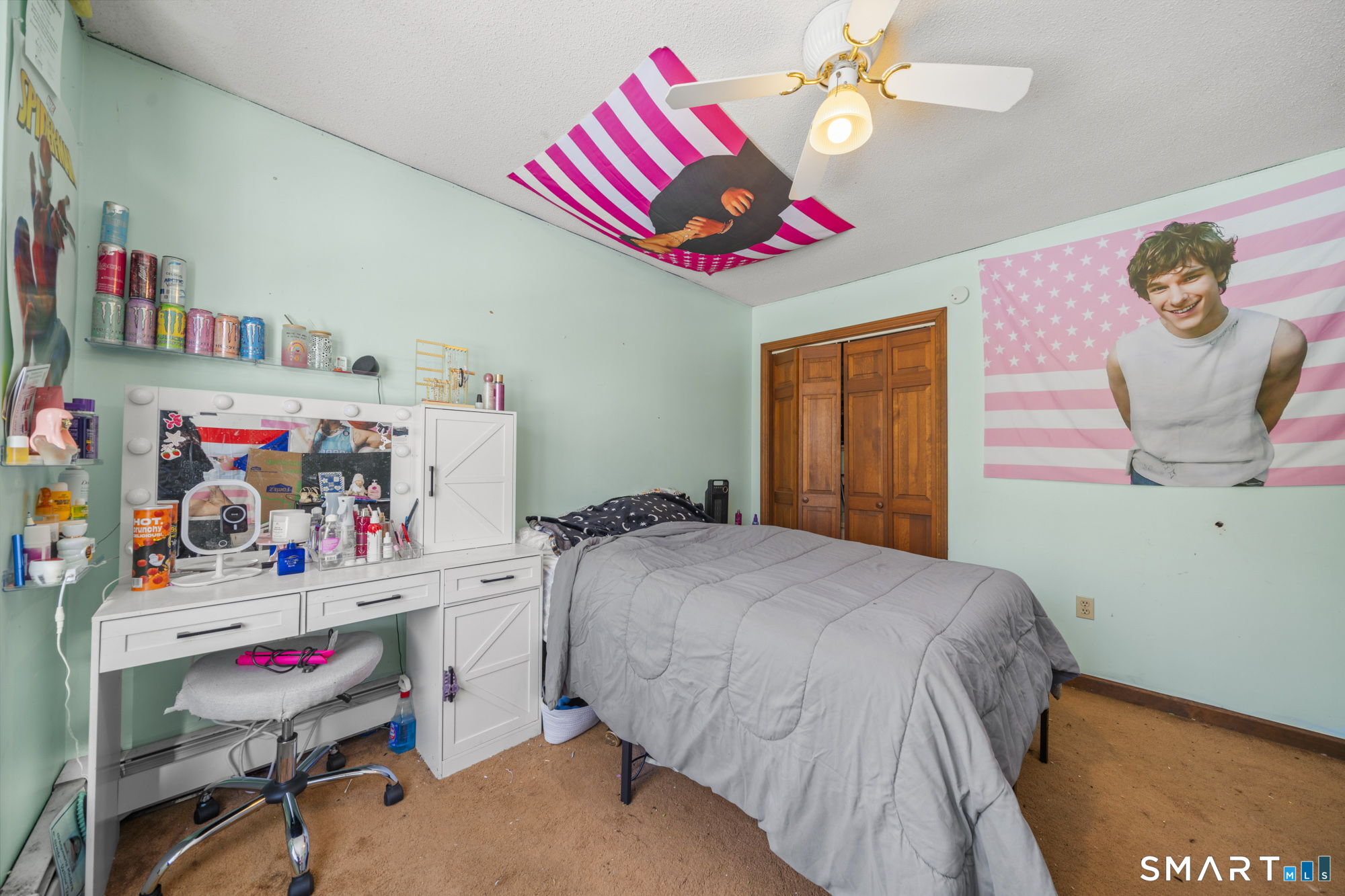 184 Black Hill Road Plainfield, CT 06374 - Photo 21 of 39 a bedroom with a bed and cabinets