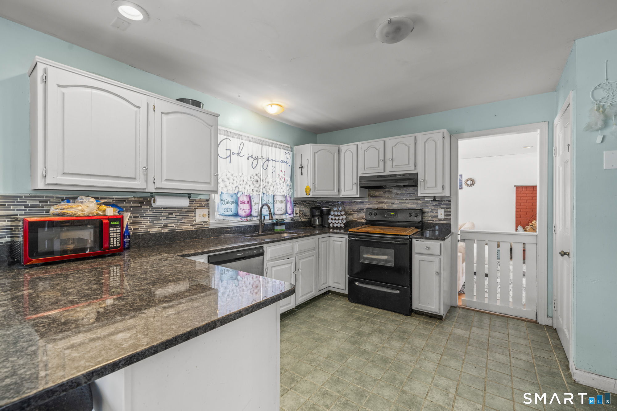 184 Black Hill Road Plainfield, CT 06374 - Photo 7 of 39 a kitchen with stainless steel appliances granite countertop a stove refrigerator sink and cabinets