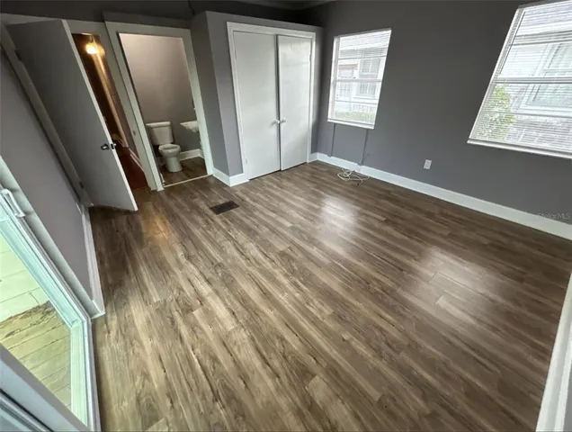 a view of an empty room and window