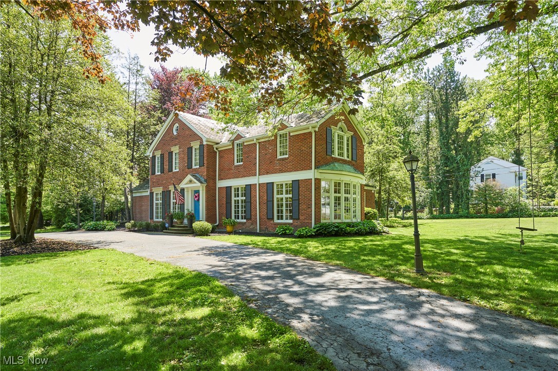 173 Hampshire Road Akron, OH 44313 - Photo 2 of 38 This elegant home has a circle driveway in front of the property, and a back drive to the garages.