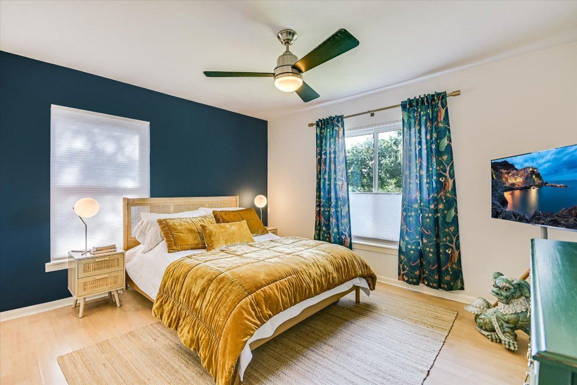 2805 South 5th Street Austin, TX 78704 - Photo 14 of 25 a bedroom with a bed and window