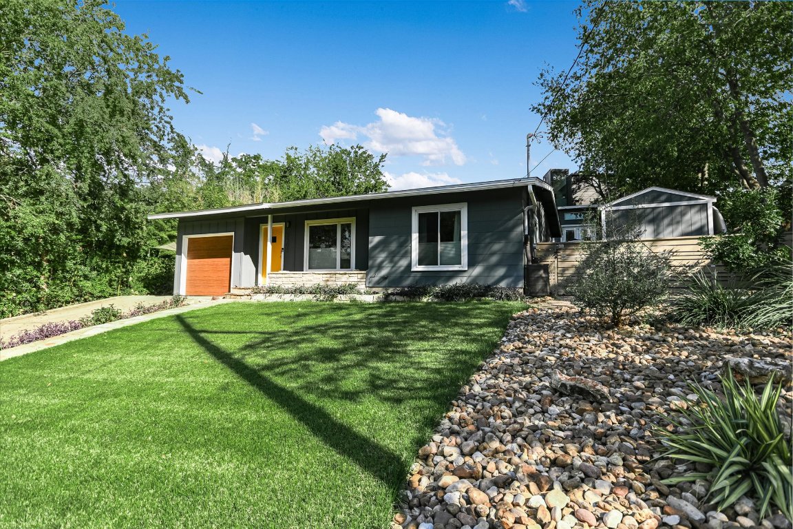 2805 South 5th Street Austin, TX 78704 - Photo 22 of 25 a front view of house with yard and green space