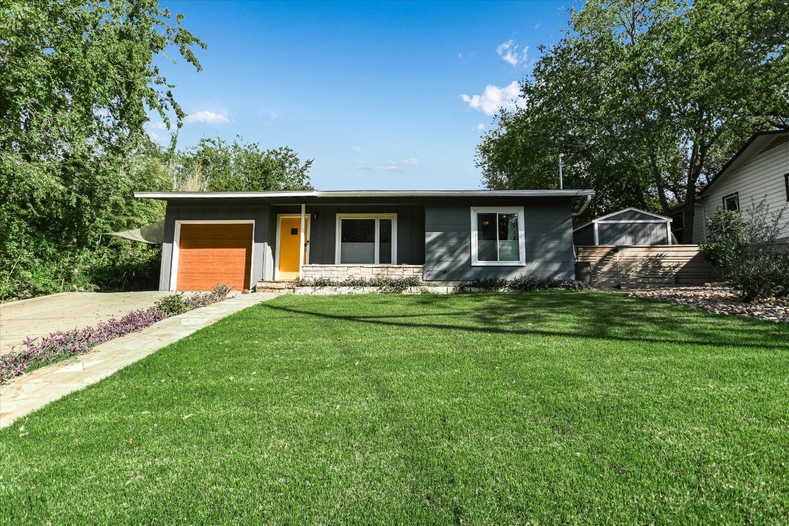 2805 South 5th Street Austin, TX 78704 - Photo 23 of 25 a front view of house with yard and green space