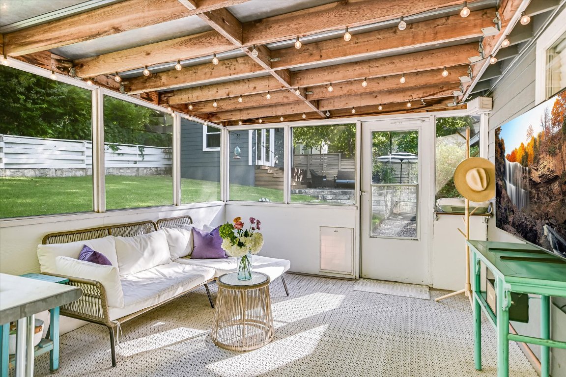 2805 South 5th Street Austin, TX 78704 - Photo 3 of 25 a roof deck with table and chairs and potted plants