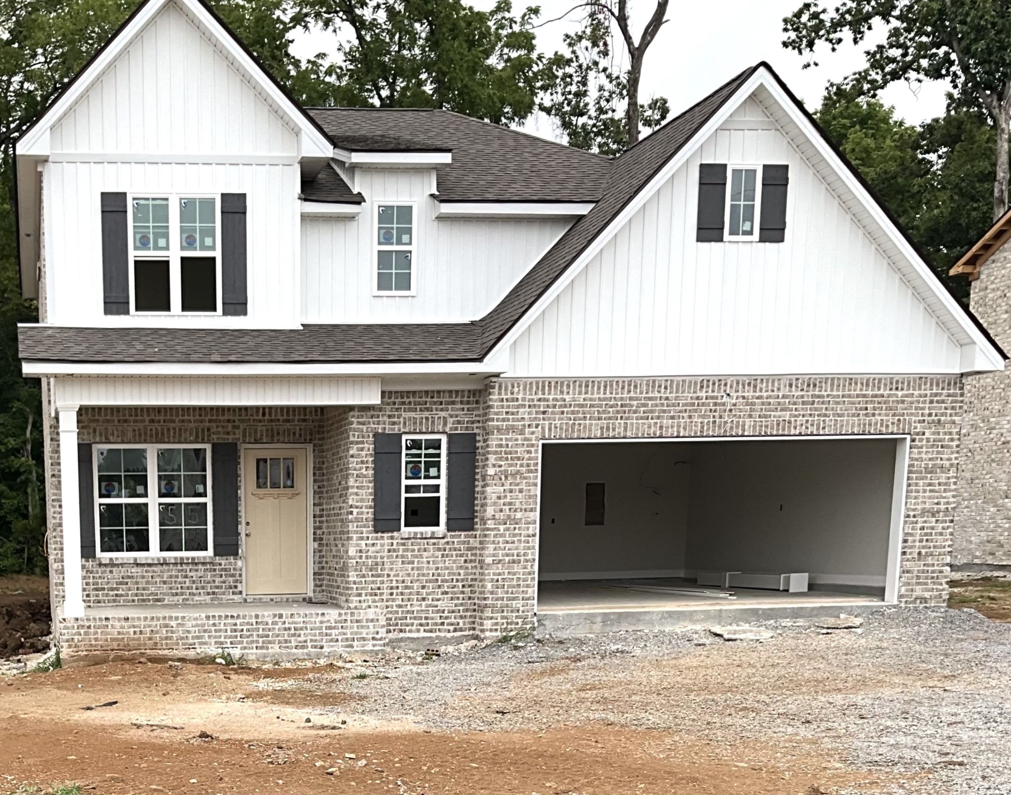 438 Ruby Oaks Lane Murfreesboro, TN 37128 - Photo 1 of 2 a front view of a house with a garage