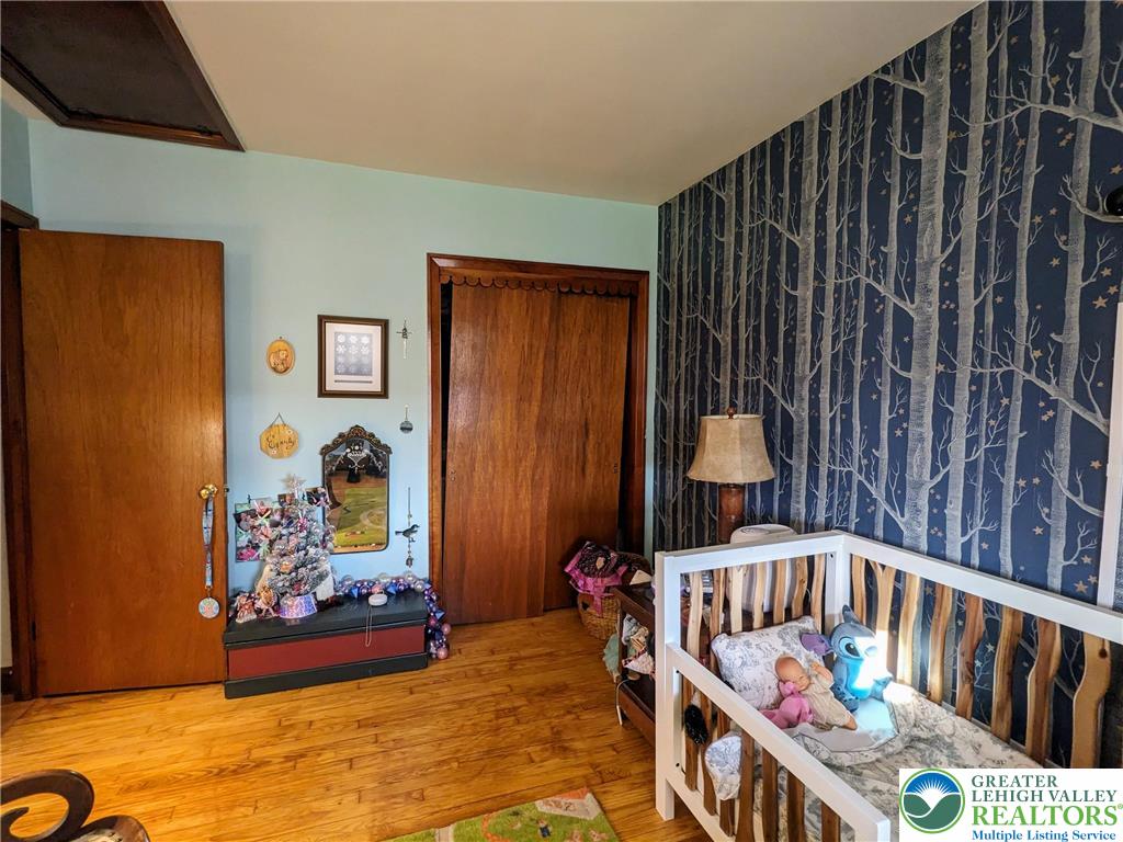 538 Belfast Road Nazareth, PA 18064 - Photo 21 of 25 a bedroom with furniture and baby crib
