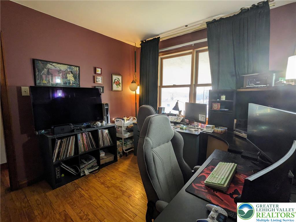 538 Belfast Road Nazareth, PA 18064 - Photo 23 of 25 a living room with furniture and a flat screen tv