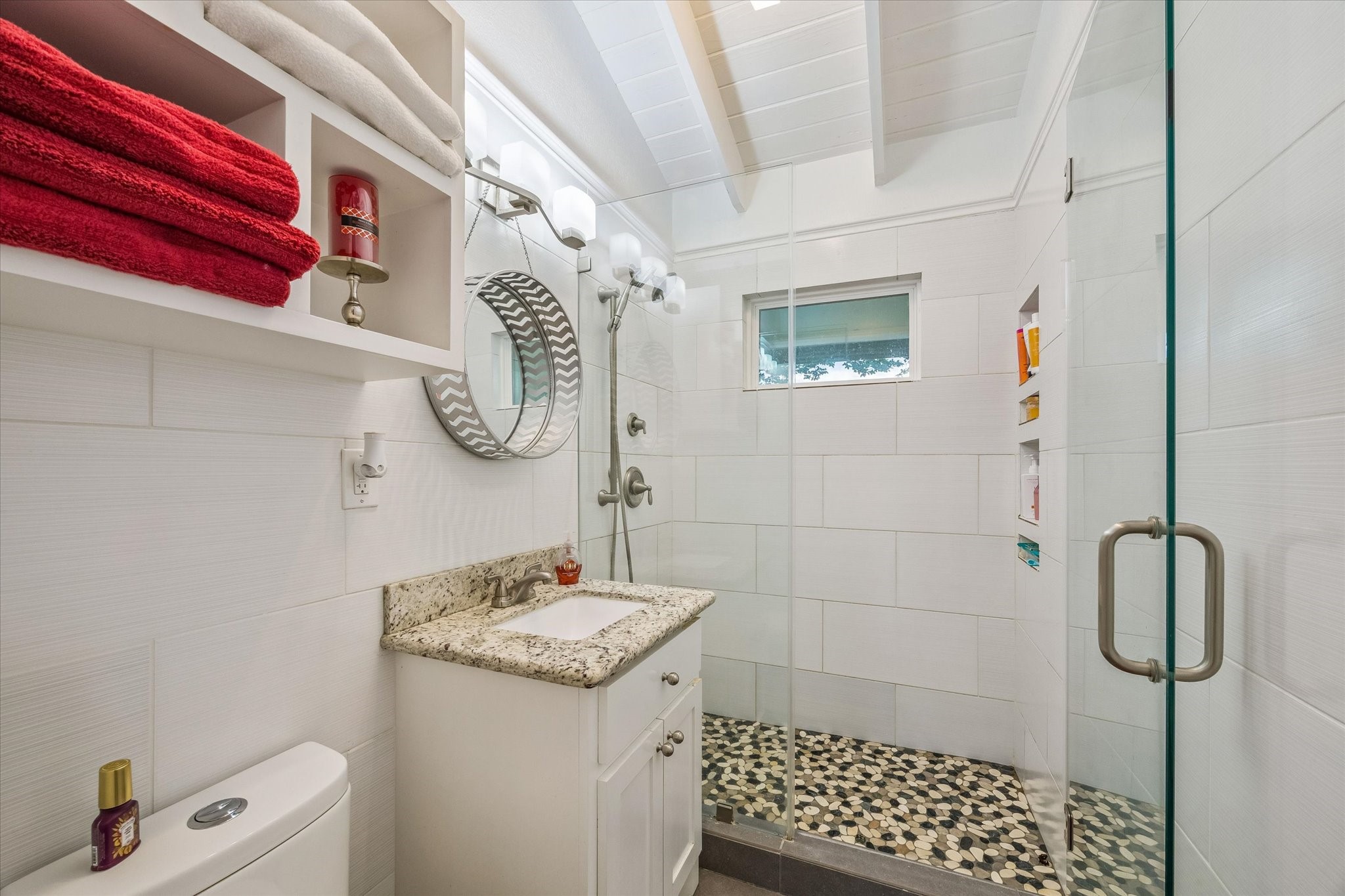 3515 County Road 36 Angleton, TX 77515 - Photo 27 of 50 a bathroom with a sink a toilet and shower