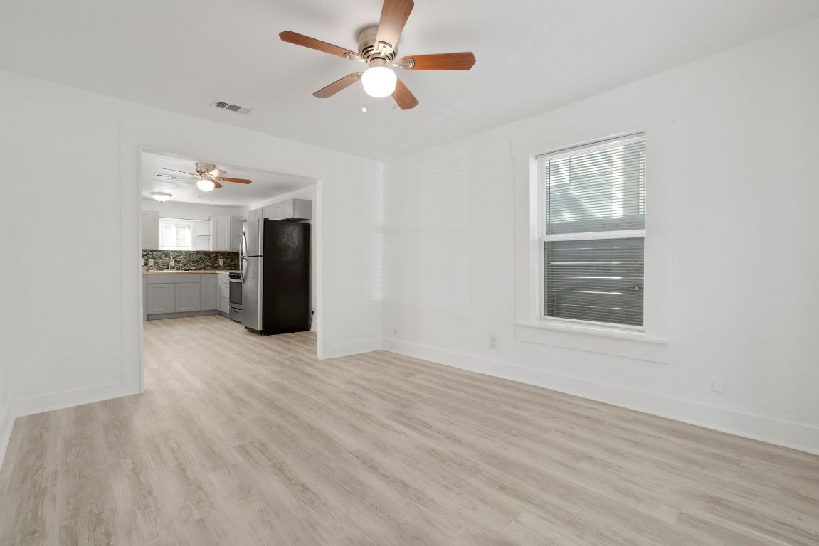 1606 Maple Avenue Austin, TX 78702 - Photo 4 of 15 a view of an empty room with a window