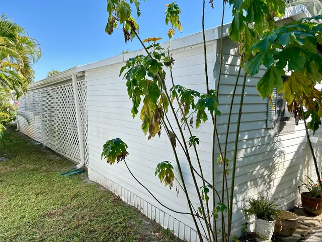 a view of a room with wooden walls