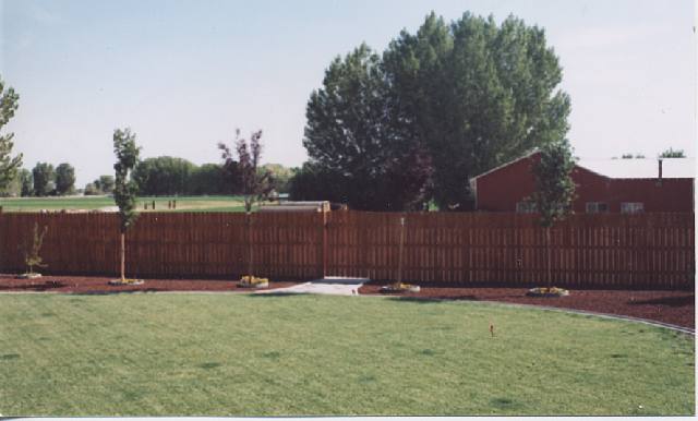 4046 Cimarron Road, Unit 1 Fallon, NV 89406 - Photo 4 of 6 a view of yard with wooden fence
