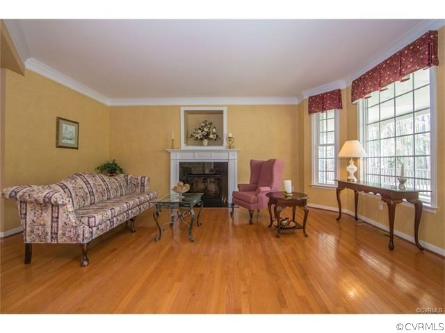 14313 Princess Mary Road Chesterfield, VA 23838 - Photo 12 of 48 a living room with furniture and a fireplace