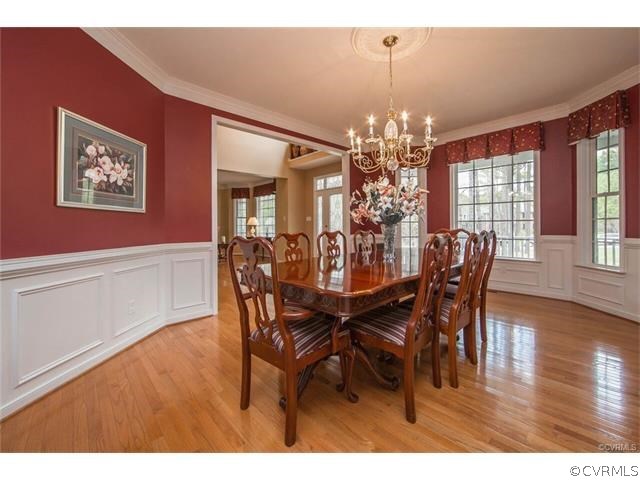 14313 Princess Mary Road Chesterfield, VA 23838 - Photo 13 of 48 a view of a dining room with furniture and wooden floor