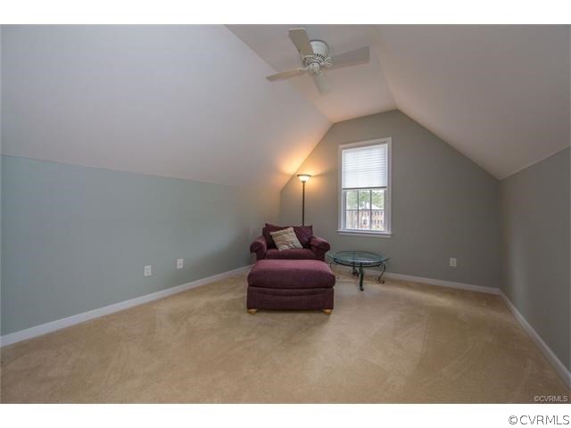 14313 Princess Mary Road Chesterfield, VA 23838 - Photo 22 of 48 a hallway with a couch and chandelier