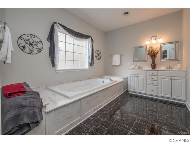 14313 Princess Mary Road Chesterfield, VA 23838 - Photo 23 of 48 a kitchen with a sink cabinets and a window