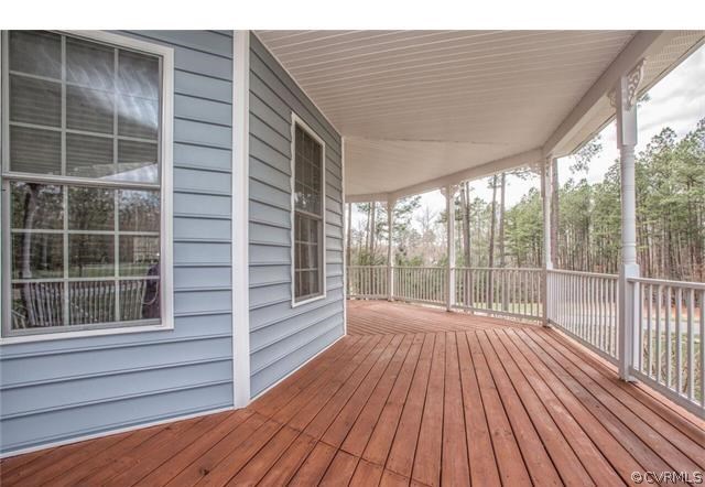 14313 Princess Mary Road Chesterfield, VA 23838 - Photo 42 of 48 a view of a balcony with wooden floor and fence