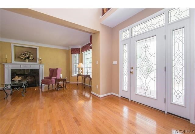 14313 Princess Mary Road Chesterfield, VA 23838 - Photo 10 of 48 a view of a livingroom with furniture and a fireplace