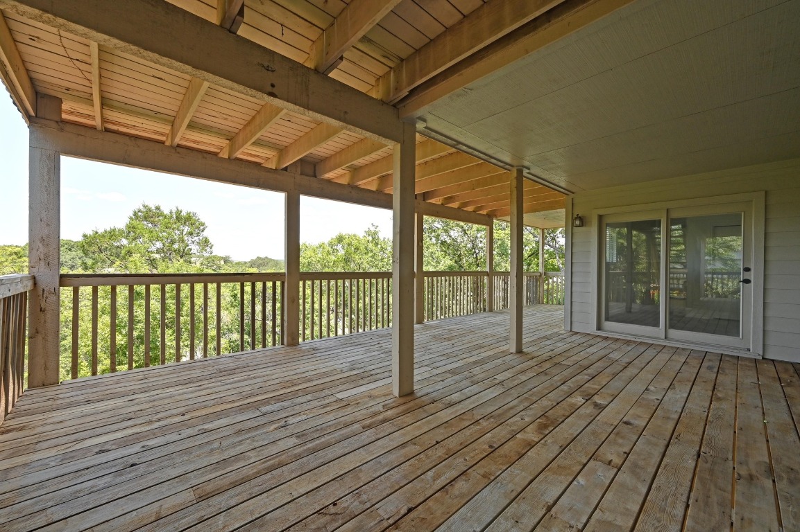 3510 Native Dancer Cove Austin, TX 78746 - Photo 27 of 35 a view of porch with wooden floor