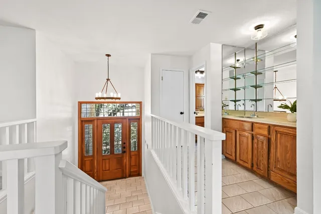 a open kitchen with a sink stove and refrigerator