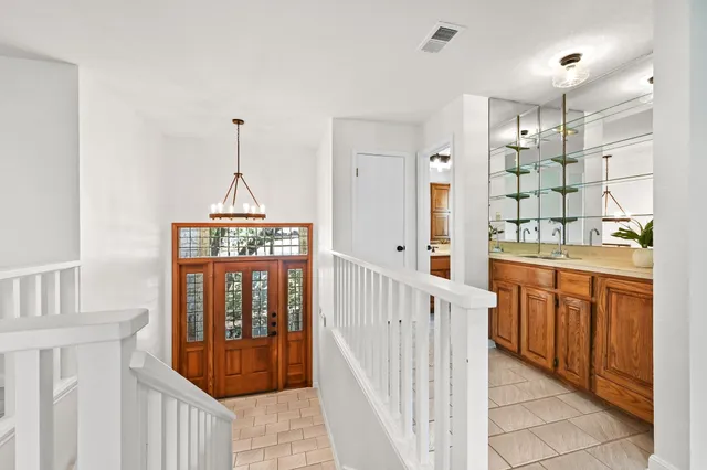 a open kitchen with a sink stove and refrigerator