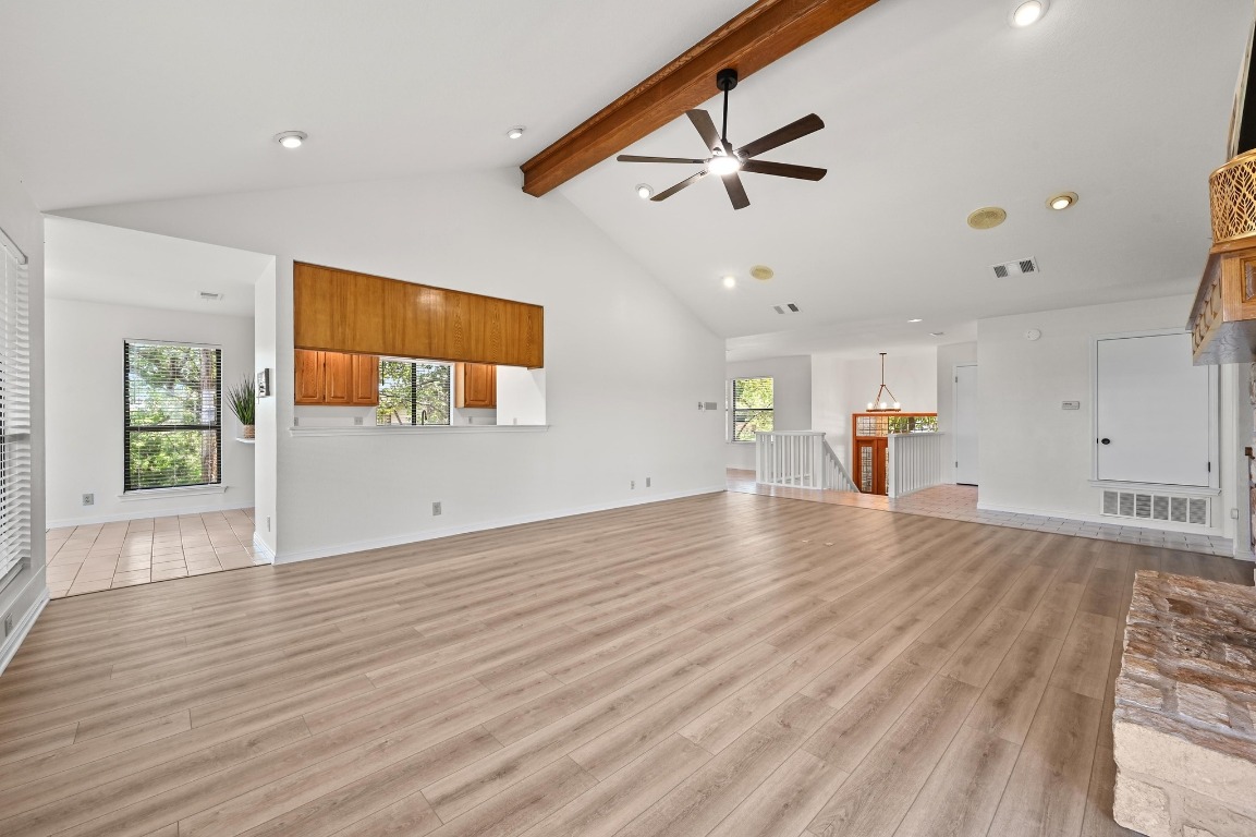 3510 Native Dancer Cove Austin, TX 78746 - Photo 8 of 35 a view of empty room with wooden floor and fan