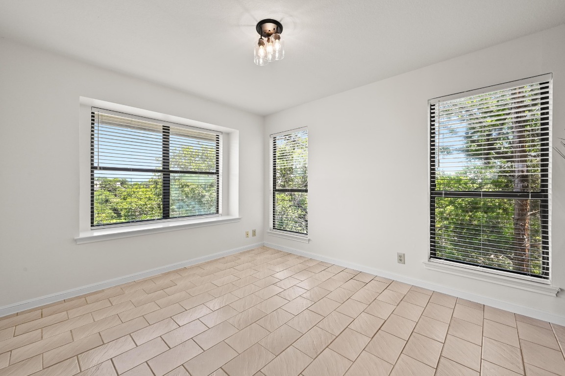 3510 Native Dancer Cove Austin, TX 78746 - Photo 10 of 35 a view of an empty room with window