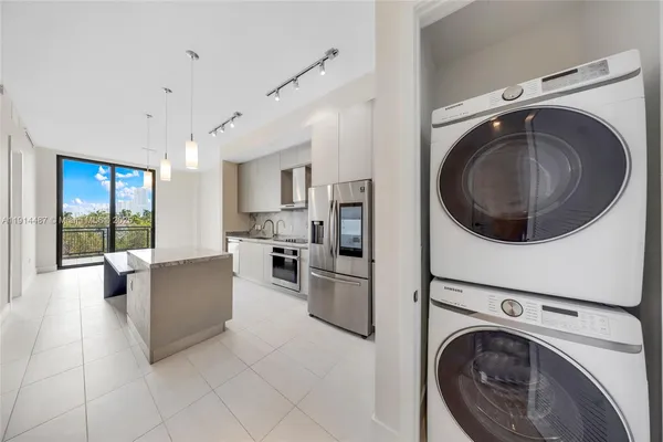 a bathroom with a double vanity sink and mirror