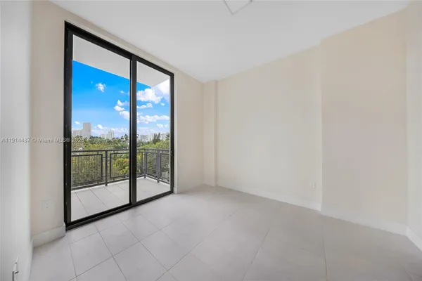 a view of a kitchen cabinets and a floor to ceiling window