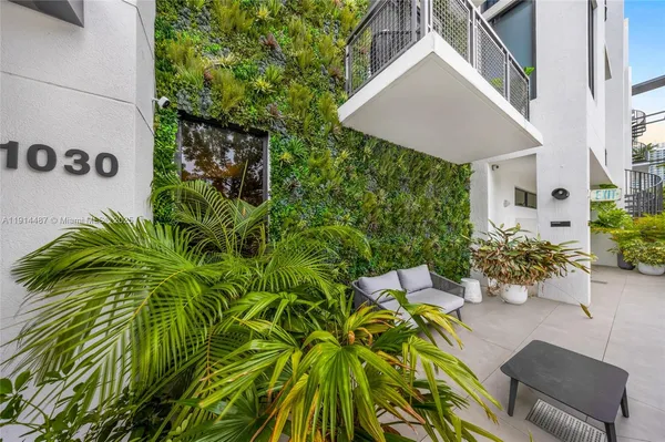 a view of a city and flowers