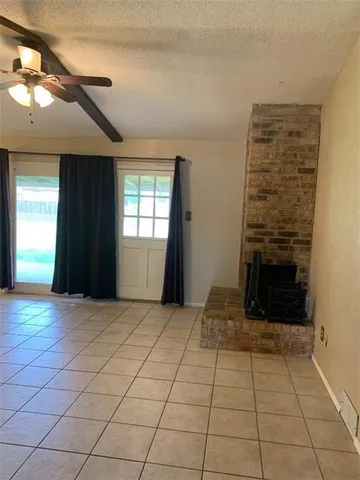 a kitchen with stainless steel appliances granite countertop a sink and a refrigerator