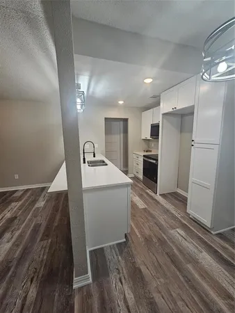 a view of a kitchen from the closet