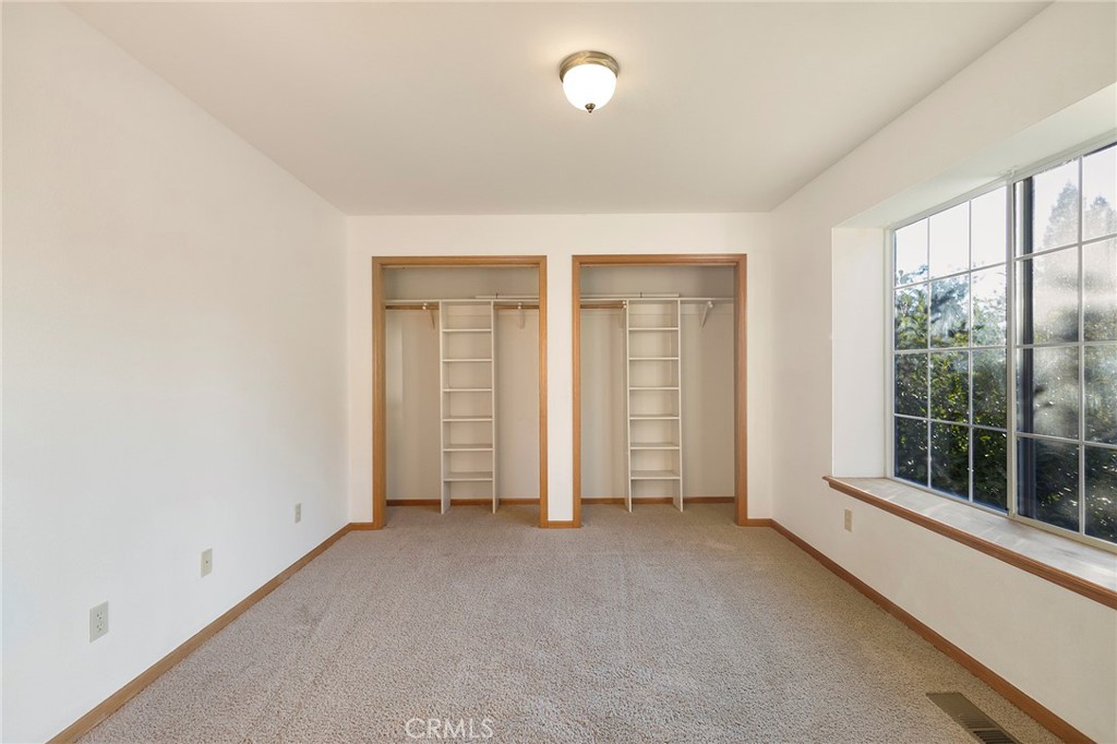 14856 Eagle Ridge Drive Forest Ranch, CA 95942 - Photo 25 of 27 an empty room with windows
