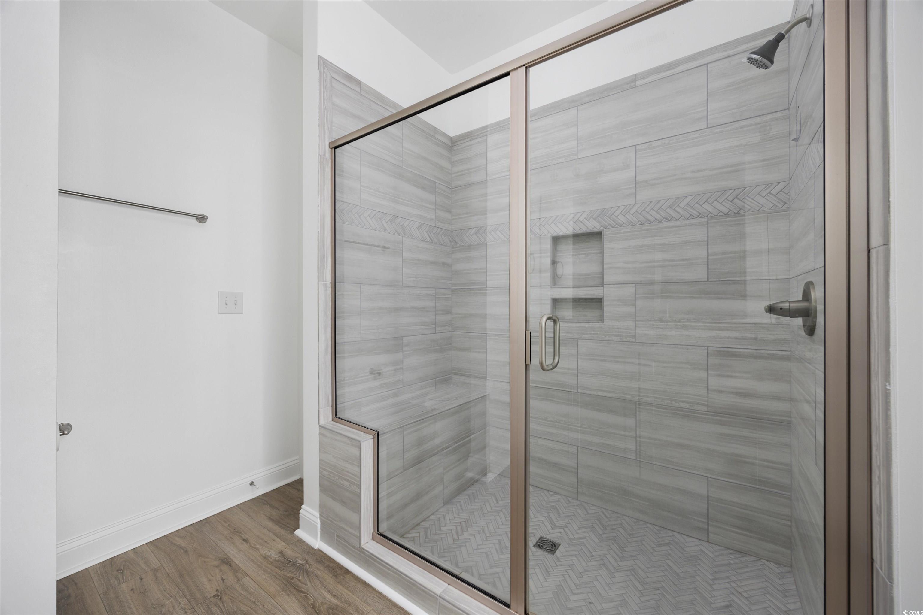 1108 Pochard Drive Conway, SC 29526 - Photo 22 of 37 Full bathroom featuring a stall shower and wood finished floors