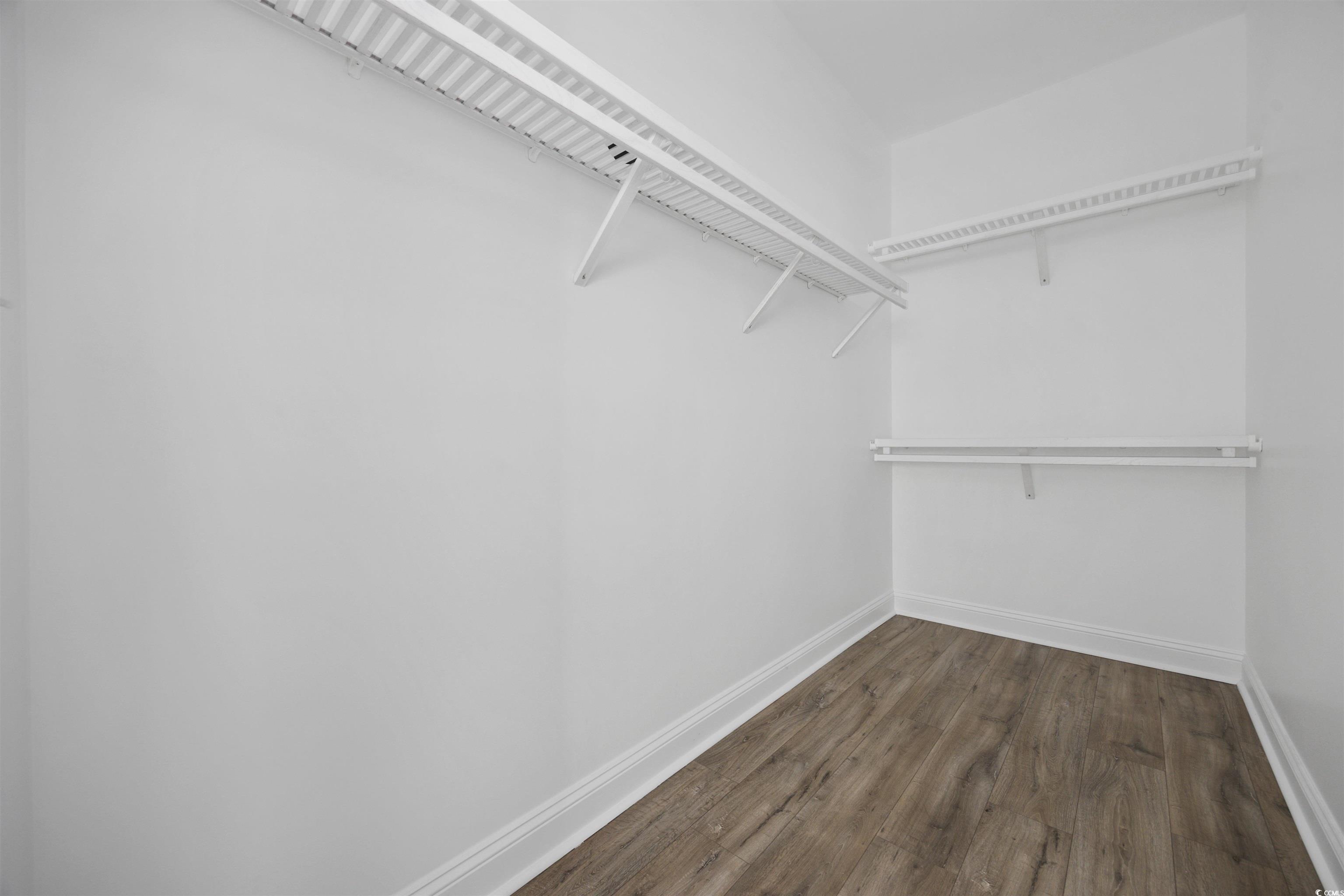 1108 Pochard Drive Conway, SC 29526 - Photo 28 of 37 Spacious closet with dark wood-type flooring