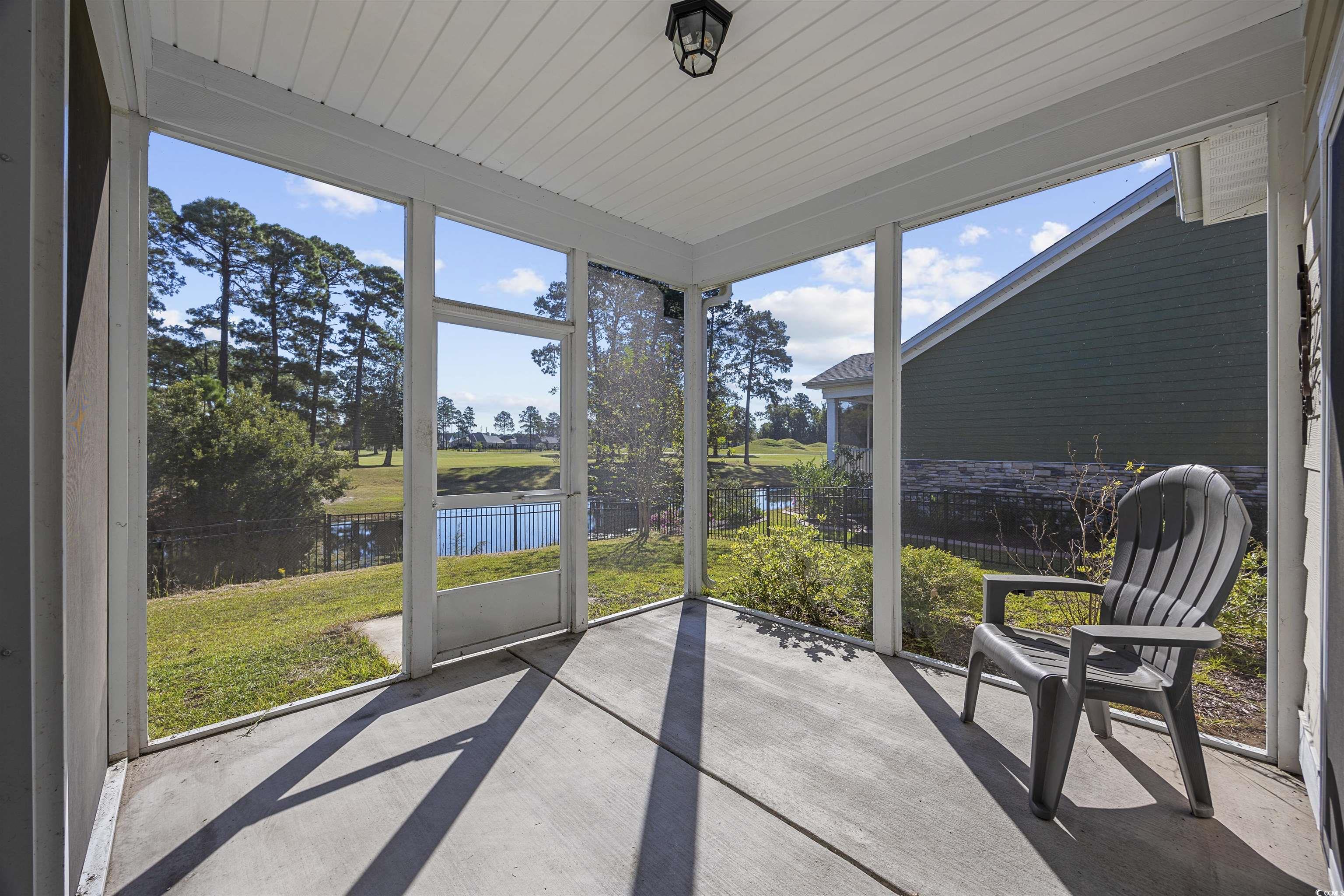 1108 Pochard Drive Conway, SC 29526 - Photo 29 of 37 Sunroom featuring a water view