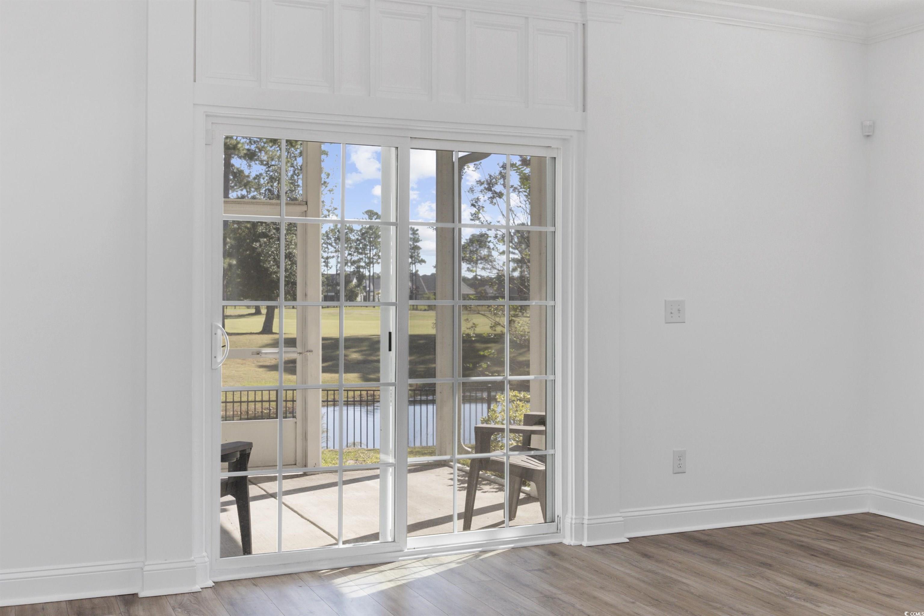 1108 Pochard Drive Conway, SC 29526 - Photo 30 of 37 Entryway with wood finished floors, a water view, and ornamental molding