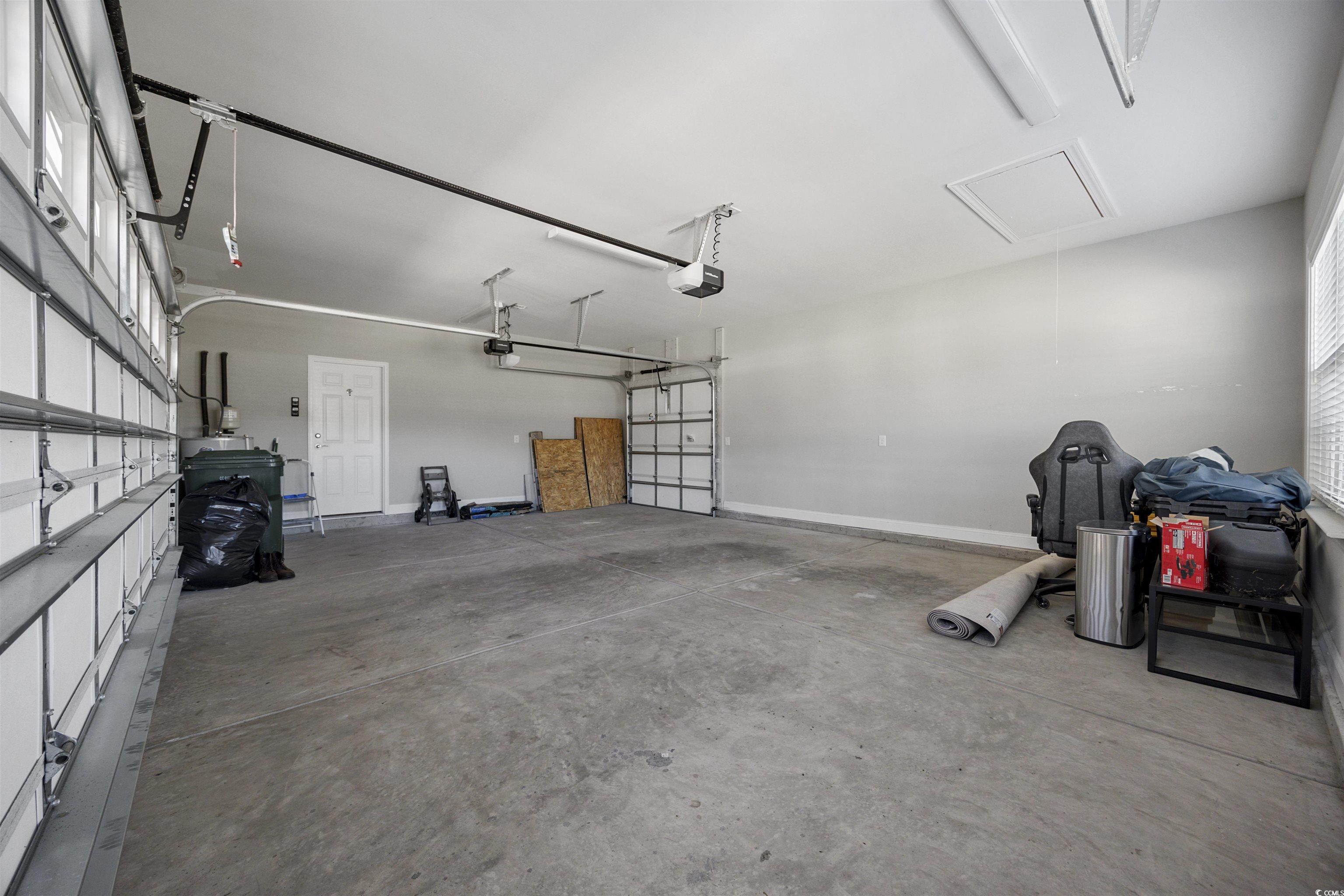 1108 Pochard Drive Conway, SC 29526 - Photo 31 of 37 Garage featuring baseboards