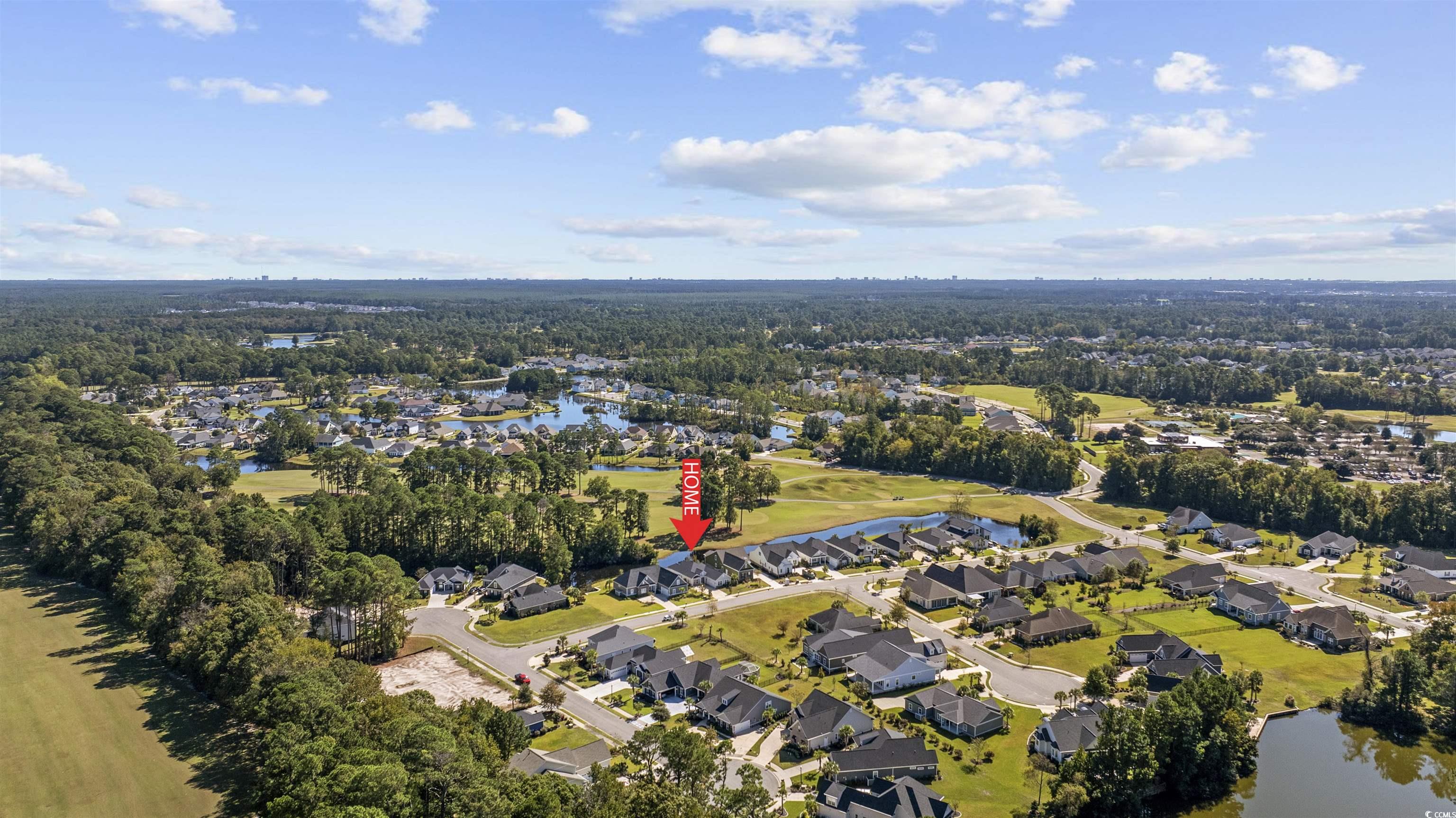 1108 Pochard Drive Conway, SC 29526 - Photo 36 of 37 Aerial overview of property's location featuring a large body of water and nearby suburban area